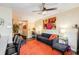 Stylish living room with modern decor, a ceiling fan, and a cozy seating area with a floral motif at 1501 Eastern Sunrise Ln, Decatur, GA 30034