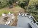 Elevated view of the backyard with a fire pit and outdoor seating area near a wooden deck at 4002 Wieuca Ne Rd, Atlanta, GA 30342