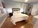 Inviting bedroom features a neatly made bed, shuttered windows, and a cozy ambiance at 4002 Wieuca Ne Rd, Atlanta, GA 30342