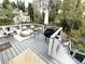 Deck with outdoor seating, grill, and space to enjoy the natural surroundings at 4002 Wieuca Ne Rd, Atlanta, GA 30342
