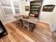 Farmhouse style dining room featuring a wooden table with light wood flooring and bright natural light at 4002 Wieuca Ne Rd, Atlanta, GA 30342