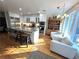 Bright and airy kitchen featuring a large island, modern appliances, and a cozy seating area by the windows at 4002 Wieuca Ne Rd, Atlanta, GA 30342