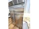 Elegant kitchen boasts a stainless steel Sub-Zero refrigerator with granite countertops and white cabinets at 4002 Wieuca Ne Rd, Atlanta, GA 30342