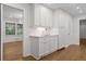 Kitchen cabinets and a counter are featured in this home. Hardwood floors throughout at 5630 Lake Forrest Dr, Sandy Springs, GA 30342