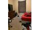 Bedroom featuring a bed, dresser, TV, and leopard-print curtains at 109 Millwheel Dr, Villa Rica, GA 30180