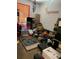 Small bedroom cluttered with boxes and various decorative items at 109 Millwheel Dr, Villa Rica, GA 30180