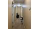 Neutral hallway with carpet flooring and access to multiple rooms at 109 Millwheel Dr, Villa Rica, GA 30180