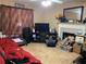 Cozy living room featuring a fireplace, TV, and unique decorative elements at 109 Millwheel Dr, Villa Rica, GA 30180