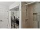 Bathroom featuring a walk-in shower and a washer/dryer at 1165 Lea Dr, Roswell, GA 30076