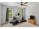 Bedroom space featuring a home office and large windows at 1165 Lea Dr, Roswell, GA 30076