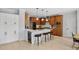 Beautiful kitchen with stainless appliances, island seating, and sleek white cabinets at 1165 Lea Dr, Roswell, GA 30076