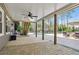 Spacious covered patio with ceiling fan overlooks the backyard pool area at 1165 Lea Dr, Roswell, GA 30076