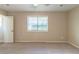 Bedroom featuring neutral carpet, a ceiling fan, and natural light at 181 Bernice Dr, Lawrenceville, GA 30045