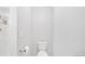 Simple toilet and toilet paper holder in a bathroom with plain white walls at 1929 Lake Heights Nw Cir # 2, Kennesaw, GA 30152