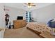 Inviting bedroom with plush carpet, a comfortable bed, and a dresser at 1929 Lake Heights Nw Cir # 2, Kennesaw, GA 30152