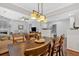 Open dining area with a view of the living room and kitchen, perfect for entertaining at 1929 Lake Heights Nw Cir # 2, Kennesaw, GA 30152