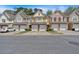 Attractive townhomes showcasing attached garages, manicured landscaping, and modern design at 1929 Lake Heights Nw Cir # 2, Kennesaw, GA 30152