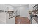 Modern kitchen featuring stainless steel appliances, granite countertops, and ample cabinet space at 1929 Lake Heights Nw Cir # 2, Kennesaw, GA 30152