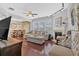 Bright living room featuring hardwood floors, a fireplace, and modern decor at 1929 Lake Heights Nw Cir # 2, Kennesaw, GA 30152