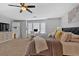 Bright and airy main bedroom with plush carpet, neutral walls, a television, and plenty of space at 1929 Lake Heights Nw Cir # 2, Kennesaw, GA 30152