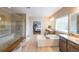 Luxurious bathroom with a soaking tub, a glass shower, and double vanities at 6626 Sterling Dr, Sandy Springs, GA 30328