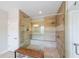 Modern bathroom featuring a glass shower with built-in bench and wood-style tile at 6626 Sterling Dr, Sandy Springs, GA 30328
