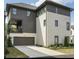 Modern exterior view showcasing the garage, driveway and landscaping at 6626 Sterling Dr, Sandy Springs, GA 30328