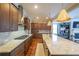 Well-appointed kitchen featuring custom cabinetry, stainless steel appliances, and a large island for cooking at 6626 Sterling Dr, Sandy Springs, GA 30328