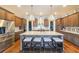 Gourmet kitchen with stainless steel appliances, granite countertops, and a center island with seating at 6626 Sterling Dr, Sandy Springs, GA 30328