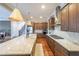 Elegant kitchen with stainless steel appliances, a spacious island, and pendant lighting at 6626 Sterling Dr, Sandy Springs, GA 30328
