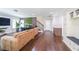 Spacious living room features hardwood floors and a large comfortable sofa at 6626 Sterling Dr, Sandy Springs, GA 30328