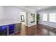 Mud room with built-in storage, seating and nearby dual wine fridge at 6626 Sterling Dr, Sandy Springs, GA 30328
