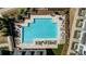 Aerial view of community pool surrounded by lounge chairs and landscaping at 6626 Sterling Dr, Sandy Springs, GA 30328