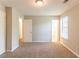 Bedroom with neutral walls, carpet flooring, and two closets at 1803 Gingham Ct, Lithonia, GA 30058