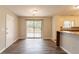 Open dining area featuring a view to the backyard and modern flooring at 1803 Gingham Ct, Lithonia, GA 30058