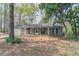Charming single story home with stone accents and a covered front porch at 1803 Gingham Ct, Lithonia, GA 30058