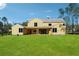 Expansive backyard with newly constructed home, showcasing ample green space for outdoor activities at 225 Maison Court, Roswell, GA 30076