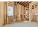 Unfinished basement space displaying plumbing in new home construction at 225 Maison Court, Roswell, GA 30076