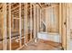 Bathroom under construction showcases plumbing elements and structure for custom design at 225 Maison Court, Roswell, GA 30076