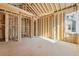 Unfinished bedroom with exposed ceiling in new home construction at 225 Maison Court, Roswell, GA 30076