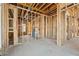 View of the house framing, electrical and plumbing, providing a glimpse into the construction of the new home at 225 Maison Court, Roswell, GA 30076
