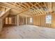 Large room framing with light from the windows, highlighting the construction and open layout at 225 Maison Court, Roswell, GA 30076