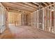 Spacious room features exposed framing, illustrating the construction of the home's design and structure at 225 Maison Court, Roswell, GA 30076