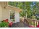 Inviting back deck perfect for relaxation and outdoor seating at 4535 Forest Green Dr, Sugar Hill, GA 30518