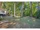 Expansive backyard with ample space for gardening and play at 4535 Forest Green Dr, Sugar Hill, GA 30518