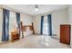 Bright bedroom featuring neutral walls, carpeted floors, and ample natural light at 4535 Forest Green Dr, Sugar Hill, GA 30518