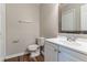 Bathroom featuring a blue sink, light gray walls, and wood look floors at 2030 Hilda Burns Pl, Lithonia, GA 30058