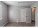 This charming bedroom provides soft carpet, access to other rooms, and a window at 2030 Hilda Burns Pl, Lithonia, GA 30058