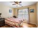 Cozy bedroom with natural light and wood-look floors, creating a warm and inviting atmosphere at 2835 Olde Town Park Dr, Norcross, GA 30071