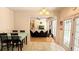 Dining area that leads to a living room, creating an open-concept living space at 2835 Olde Town Park Dr, Norcross, GA 30071